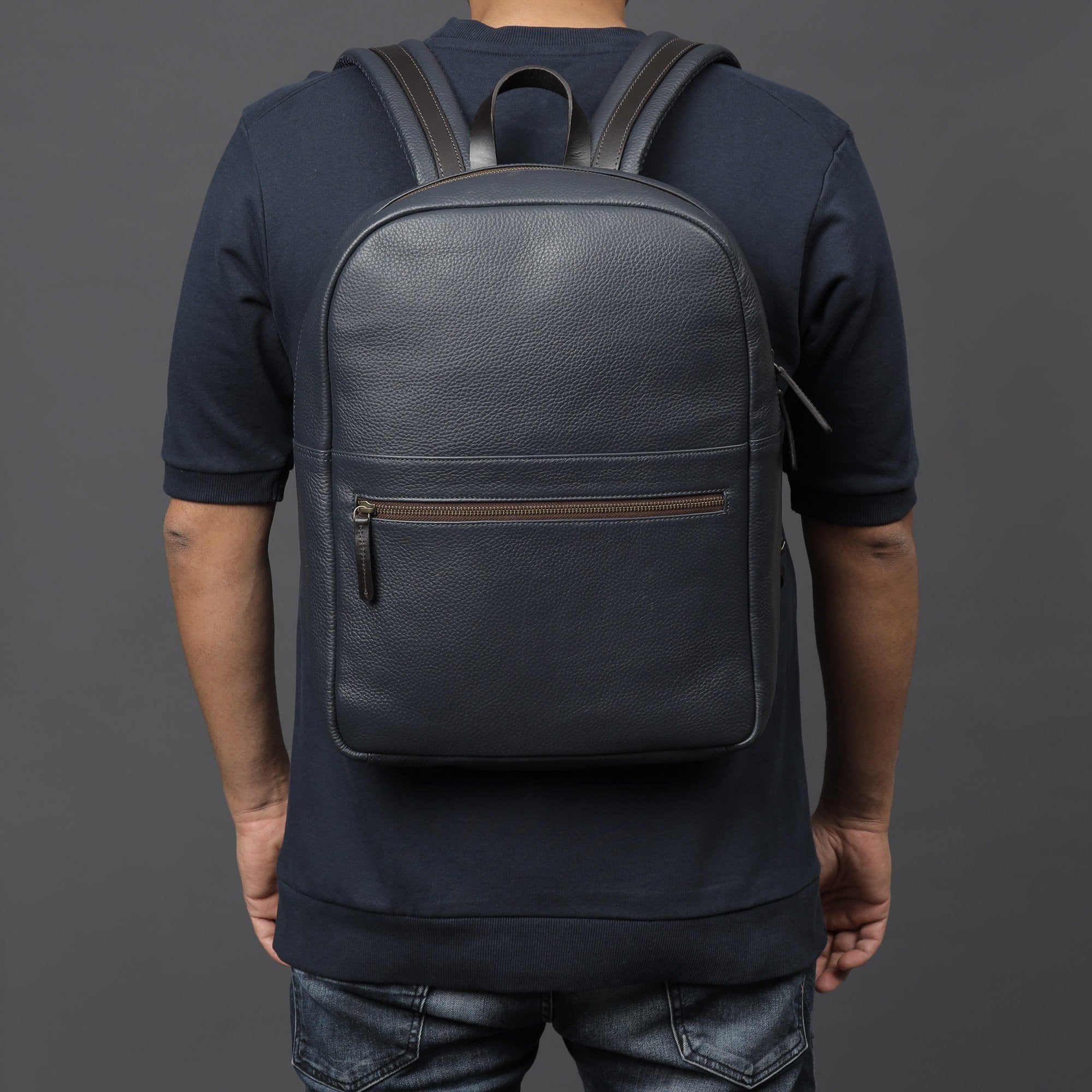 navy leather travel backpack