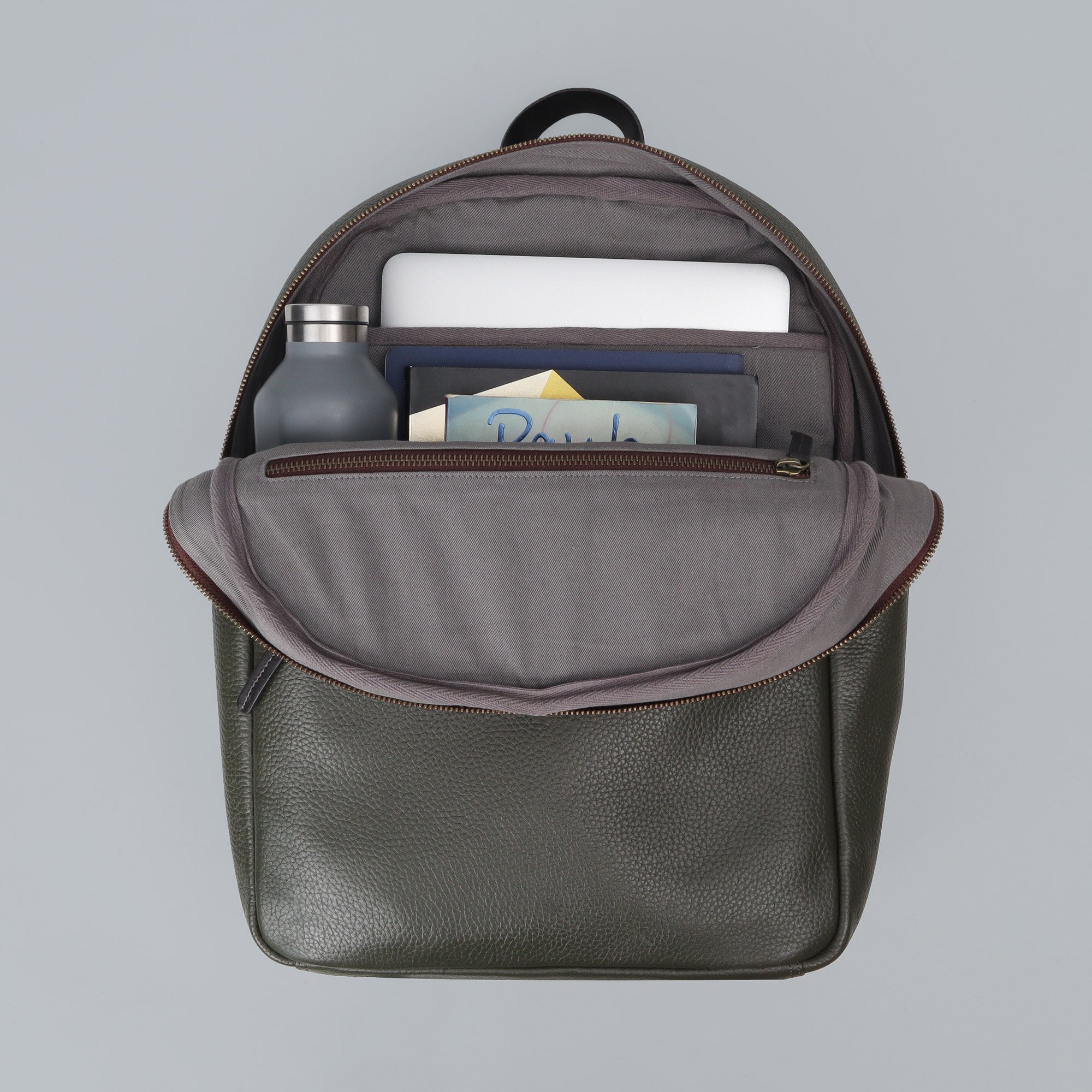 Green leather college backpack