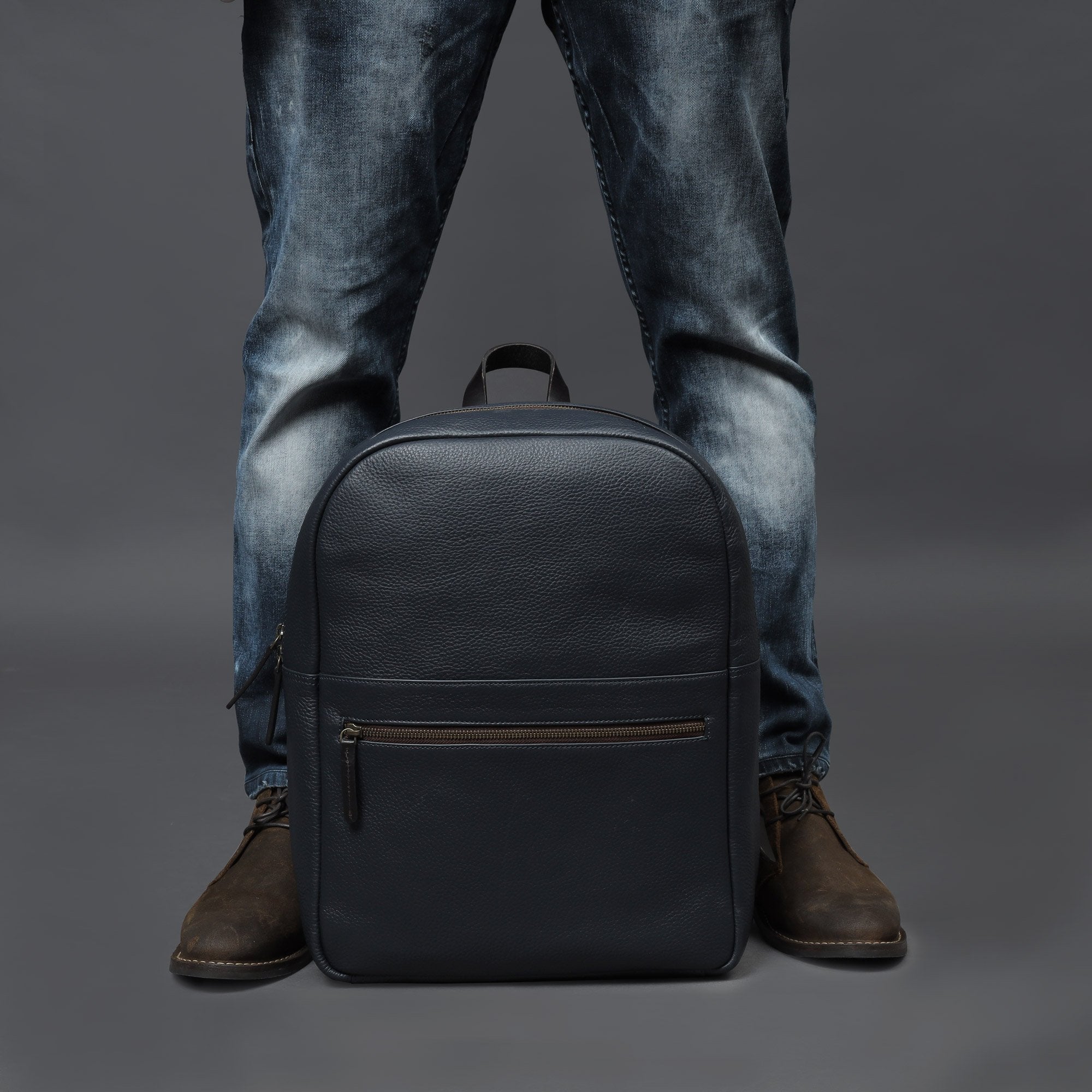 navy leather travel backpack