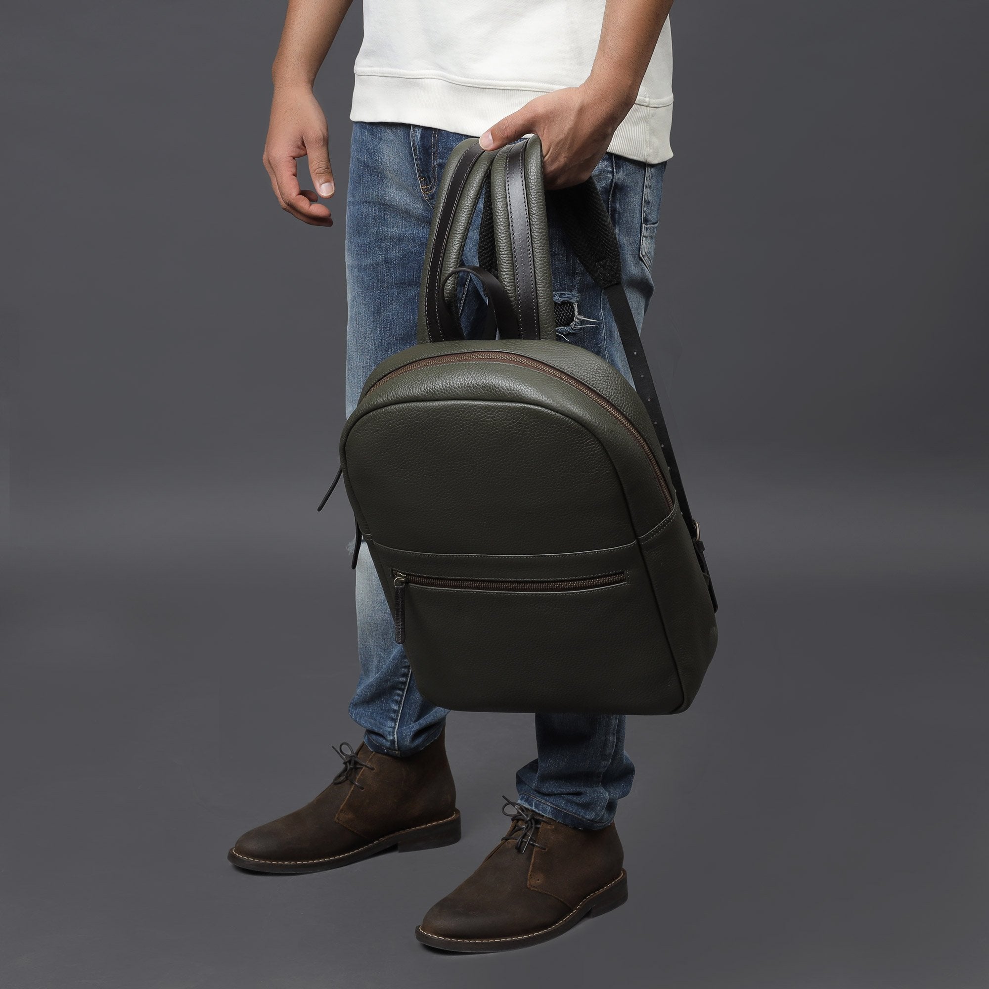 Green leather travel backpack