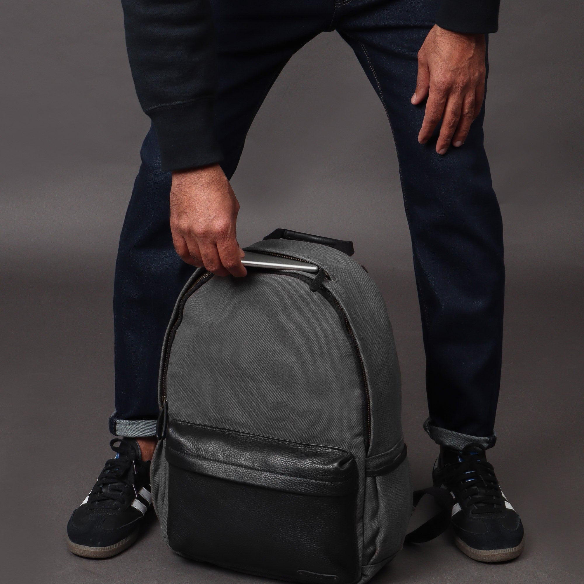 grey canvas travel backpack