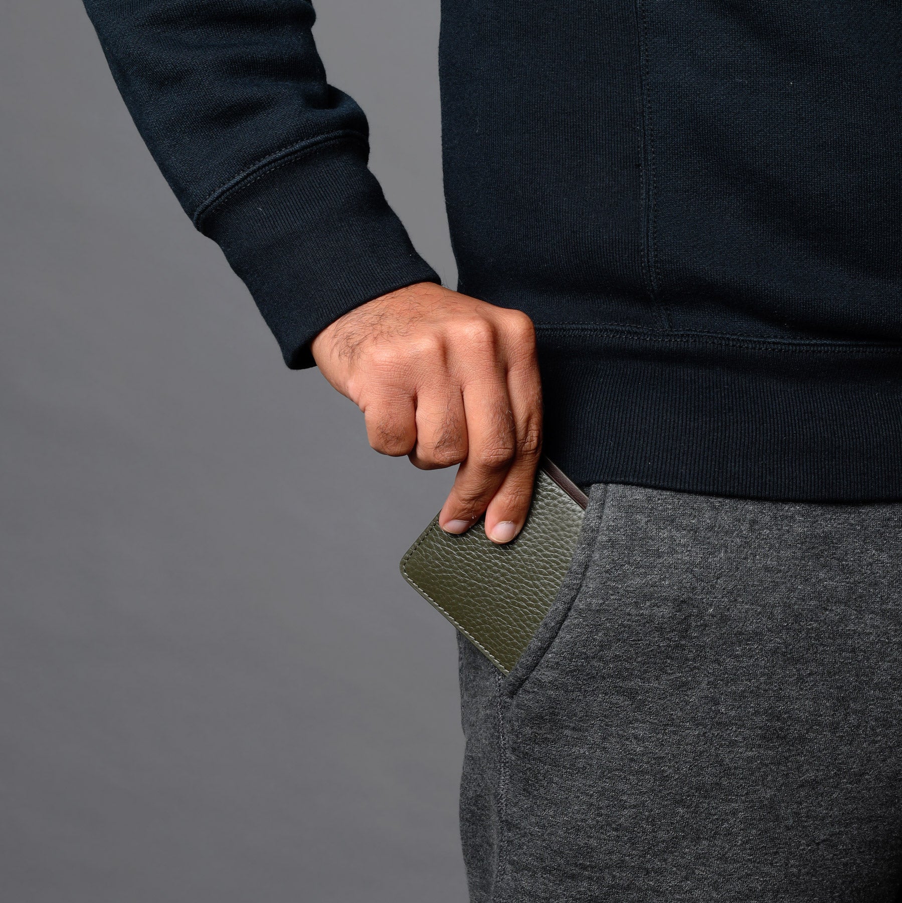 Green leather bi-fold wallet for men