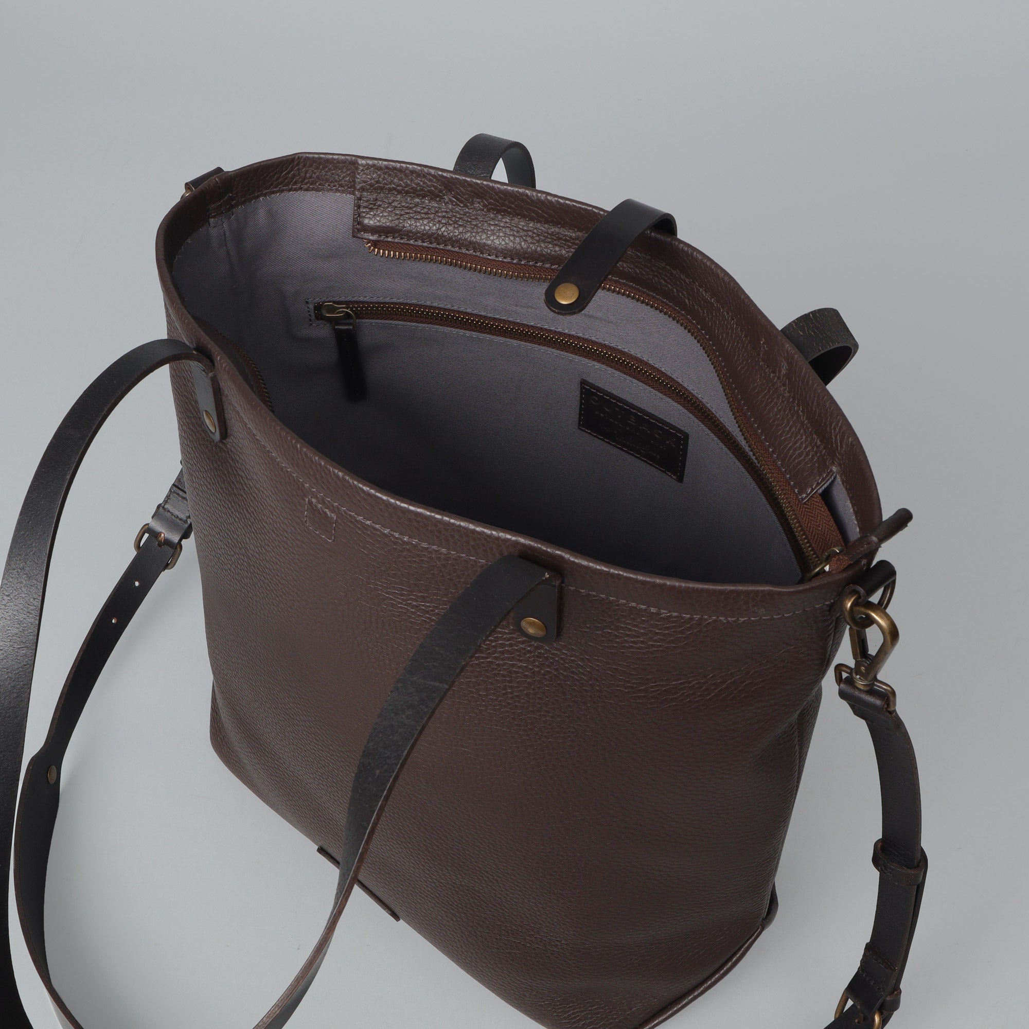 Spacious leather canvas tote