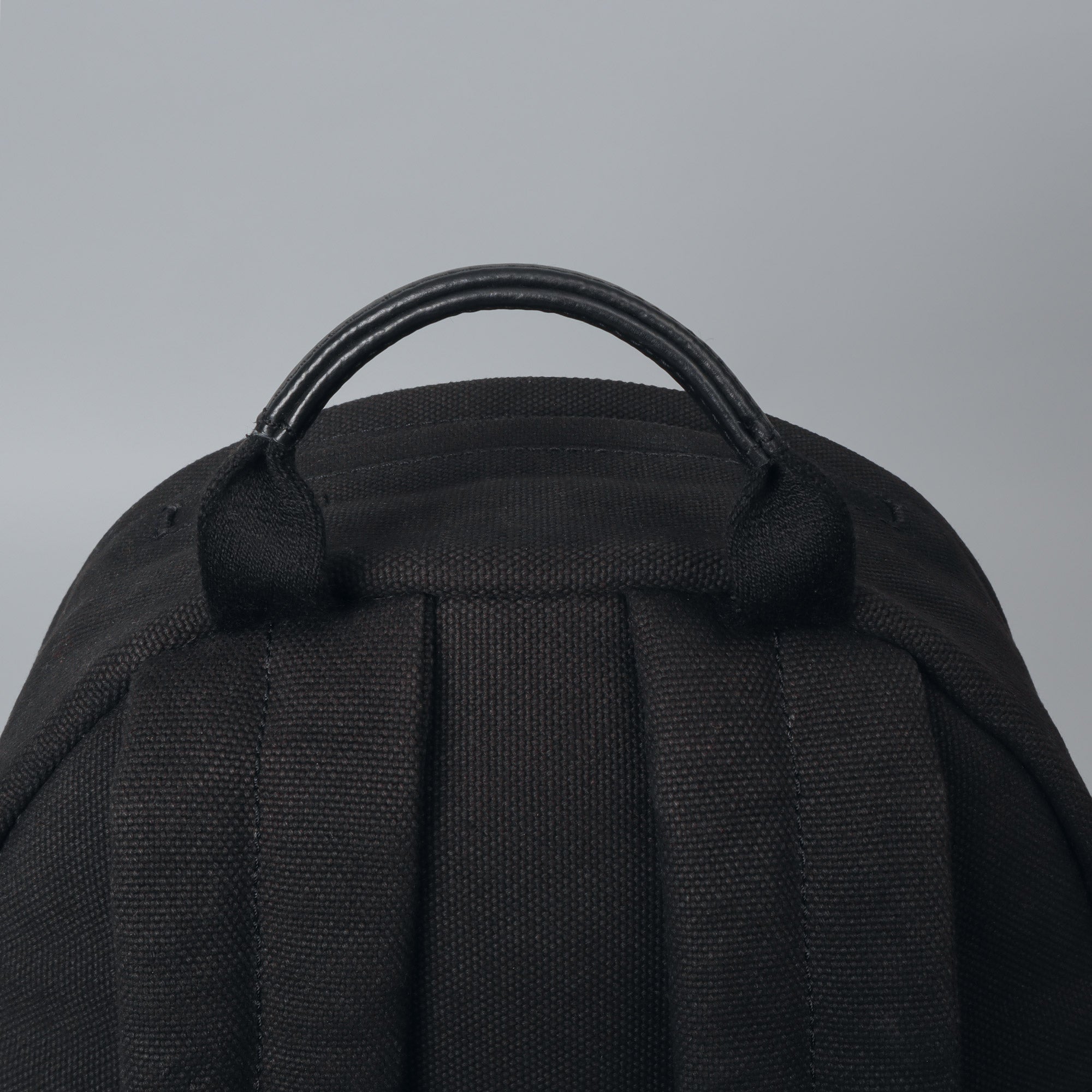 black canvas travel backpack
