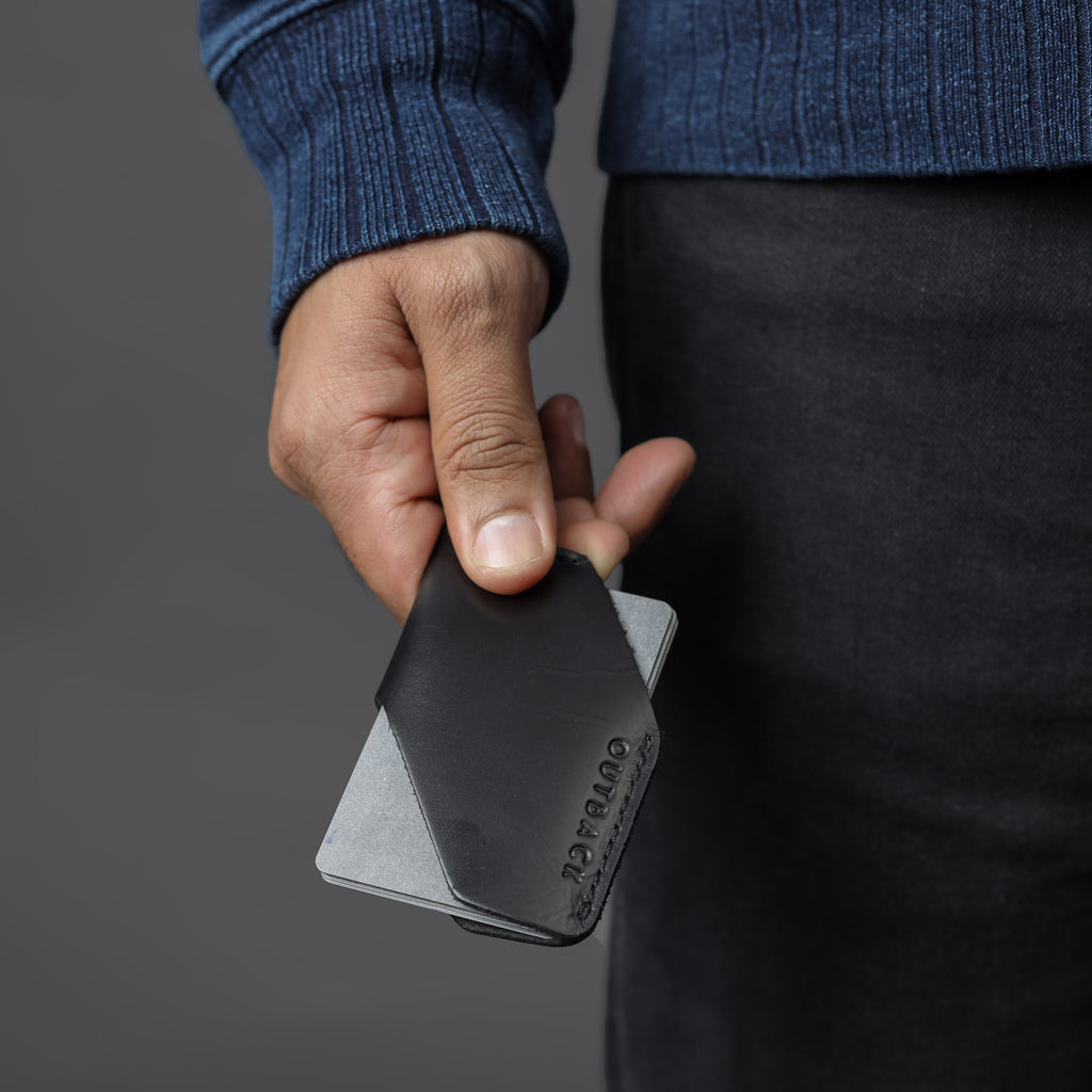 black leather card sleeve